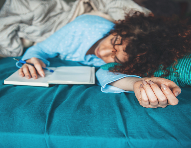 Woman in bed who is sleeping